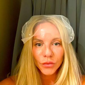 Bridal veil fascinator with pearl lace and diamond combs